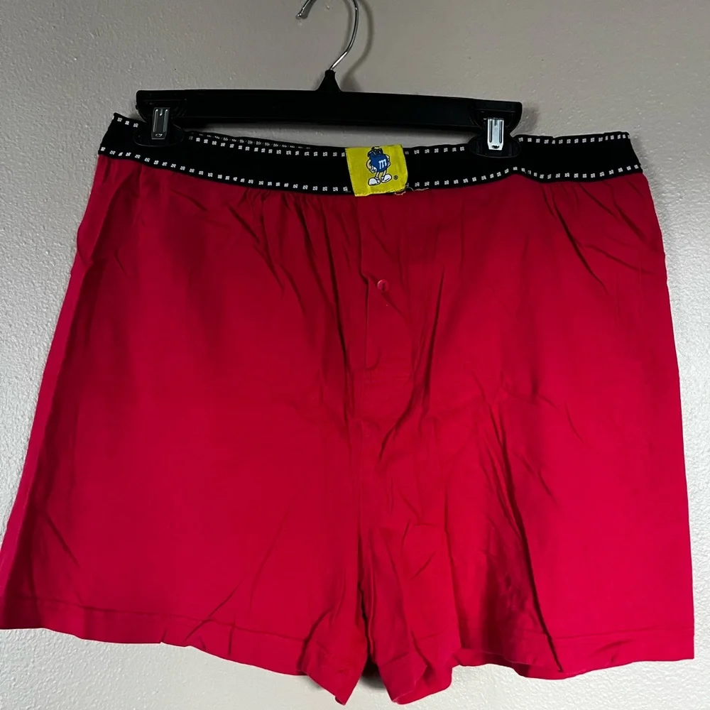 Vibrant red M&M’s women’s shorts with elastic waistband. Women’s Size Large